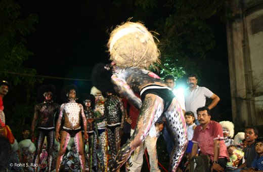 Tiger Dancer Tossing Rice Mudi